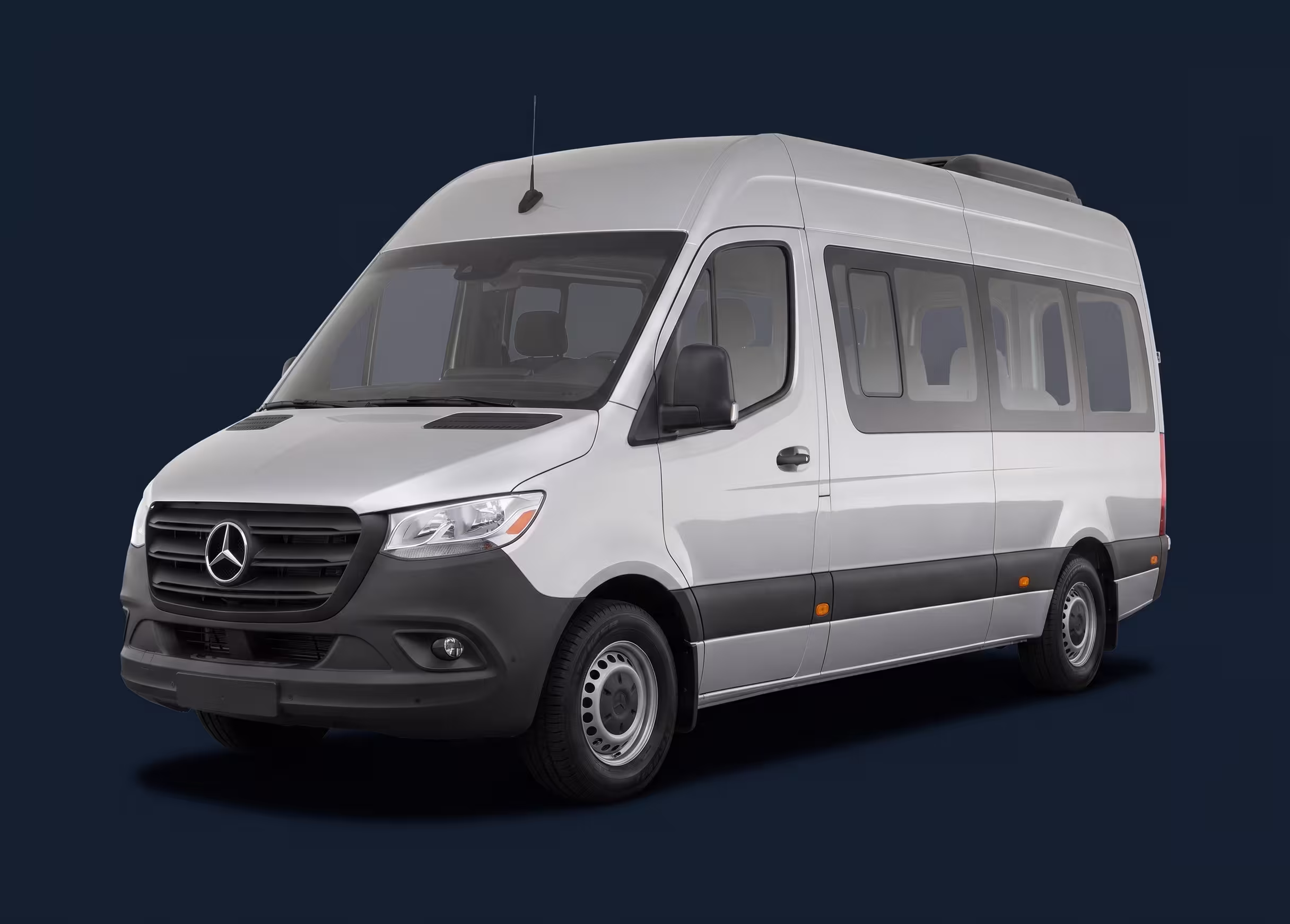 White Mercedes-Benz Sprinter passenger van used for private airport transfers and guided tourist transportation services.